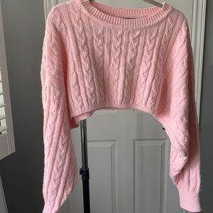 Cropped cable knit pink sweater